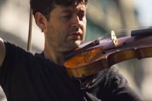 Picture of violist Lawrence Power on the roof of St John's Smith Square