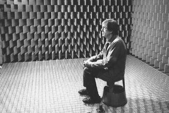 Picture of John Cage in Harvard University's Anechoic Chamber